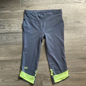 Grey and yellow under armor leggings, size medium. Excellent condition.
